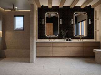 Experience modern luxury in this stunning bathroom, featuring a spacious walk-in shower with a built-in bench and a small window offering scenic views.