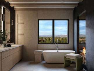 Experience luxury and tranquility in this stunning bathroom, featuring a freestanding soaking tub with breathtaking panoramic views of the surrounding landscape.