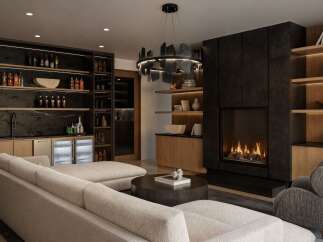 Experience luxury living in this modern lounge, featuring a fully stocked bar with dual beverage refrigerators and extensive shelving for your collection.