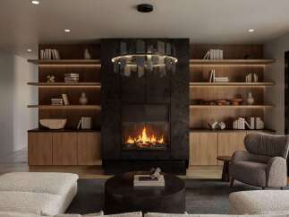 Experience modern luxury in this stunning living room, featuring a sleek fireplace as the centerpiece, flanked by elegant built-in shelving.