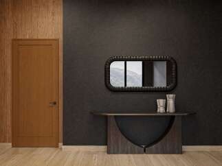 Discover modern elegance with this stunning entryway featuring a warm wood-paneled accent wall and a sleek, dark-toned door.