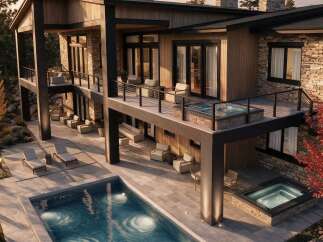 Experience luxury living with this stunning modern home featuring a private swimming pool and multiple hot tubs, perfect for relaxation and entertainment.