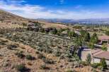 Experience luxury living in this stunning hillside estate, offering breathtaking panoramic views of the city and surrounding mountains.