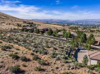 Experience luxury living in this stunning hillside estate, offering breathtaking panoramic views of the city and surrounding mountains.