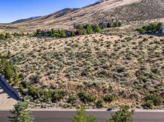 Discover luxury living nestled in a picturesque hillside setting.