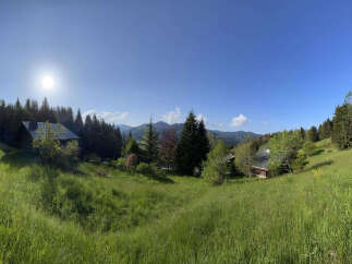 Nestled amidst rolling green hills and lush meadows, this charming property offers a serene escape.