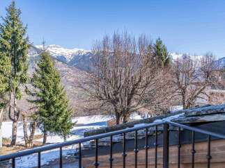 Experience breathtaking mountain views from this charming property, perfect for a serene getaway.