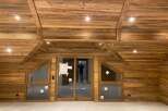 Experience rustic charm and modern comfort in this beautifully appointed wooden interior.
