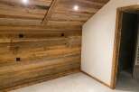 Experience rustic charm and modern comfort in this beautifully appointed room.