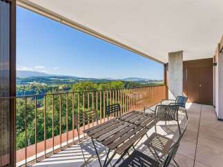 Enjoy breathtaking panoramic views from this spacious balcony, perfect for outdoor dining or relaxation.