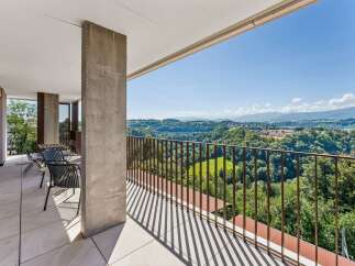 Experience breathtaking panoramic views from this stunning balcony, perfect for enjoying your morning coffee or evening relaxation.