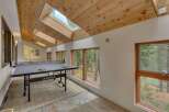Enjoy indoor fun year-round in this spacious game room, complete with a professional JOOLA ping pong table.