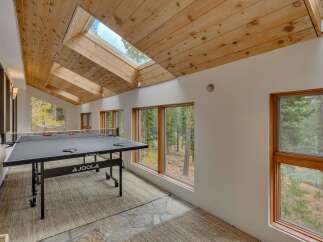 Enjoy indoor fun year-round in this spacious game room, complete with a professional JOOLA ping pong table.