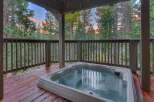 Enjoy a relaxing soak in this spacious hot tub, perfectly situated on a private wooden deck.