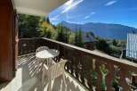 Enjoy breathtaking mountain views from this charming balcony, perfect for your morning coffee or evening relaxation.
