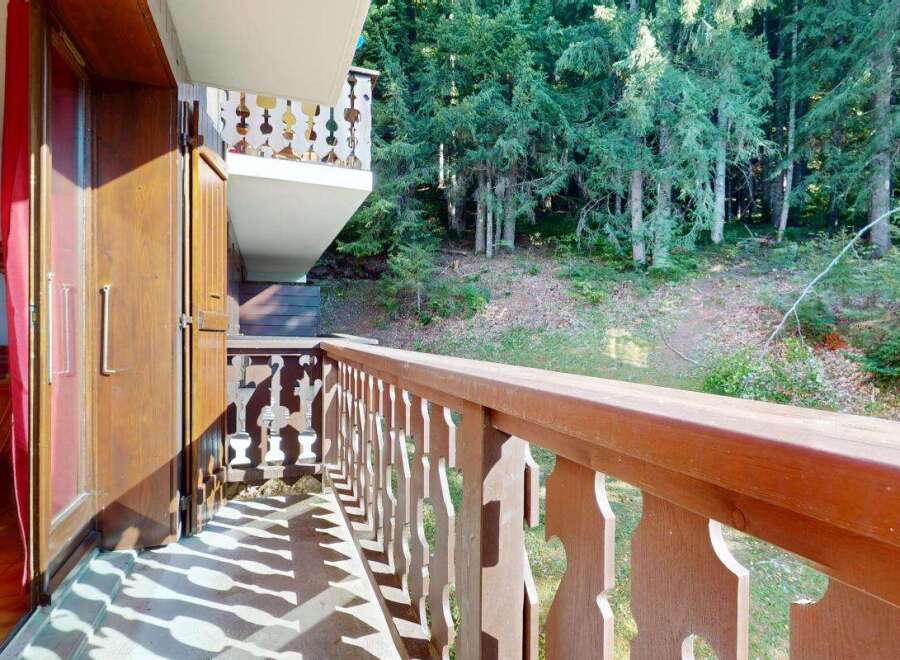 Enjoy the serene mountain views from this charming balcony, perfect for your morning coffee or evening relaxation.