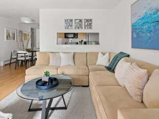 Step into this inviting living space, perfect for relaxation and entertaining.