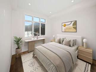 Experience modern comfort in this beautifully appointed bedroom, featuring a plush king-sized bed and elegant decor.