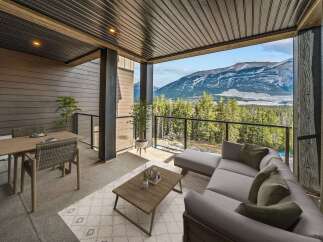 Experience breathtaking mountain views from this stunning covered patio, perfect for year-round enjoyment.