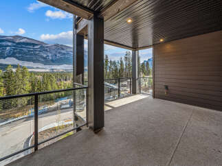 Experience breathtaking mountain views from this spacious balcony, perfect for enjoying your morning coffee or evening relaxation.