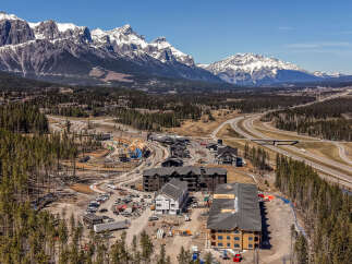 Experience luxury mountain living with this stunning new construction development nestled against a backdrop of majestic snow-capped peaks.