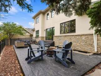 Enjoy outdoor living at its finest with this spacious patio, perfect for entertaining.