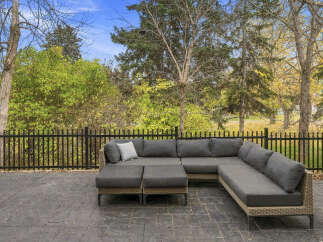 Enjoy outdoor living with this spacious sectional sofa, perfect for lounging on your patio.