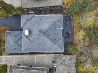 Experience luxury living in this stunning aerial view of a modern home.