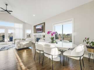 Experience modern living in this stunning open-concept living and dining area.