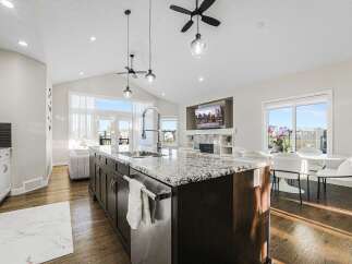 Experience luxury living in this stunning open-concept kitchen and dining area.