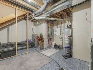 Discover the potential of this unfinished basement, perfect for customization.