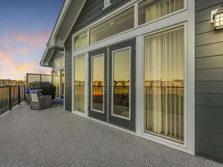 Enjoy stunning sunset views from this spacious deck, perfect for entertaining or relaxing.