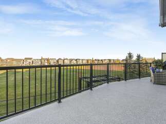 Enjoy breathtaking views from this expansive deck, perfect for entertaining or relaxing.