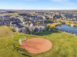 Experience the perfect blend of suburban tranquility and urban convenience in this stunning aerial view.