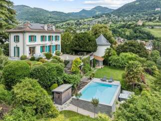 Experience luxury living in this stunning property featuring a modern swimming pool and a relaxing hot tub, perfect for unwinding.