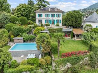Experience luxury living in this stunning property featuring a pristine swimming pool and a relaxing hot tub, perfect for unwinding.
