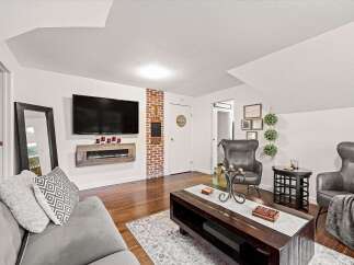 Step into this inviting living room, perfect for relaxation and entertainment.