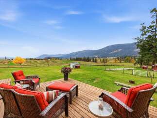 Enjoy breathtaking panoramic views from this expansive deck, perfect for outdoor entertaining or quiet relaxation.