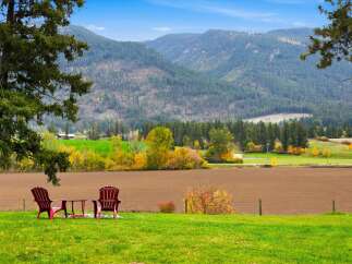 Experience breathtaking mountain views from this serene property, perfect for relaxation and outdoor enjoyment.