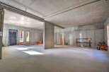 Discover the potential of this unfinished concrete space, perfect for customization and development.