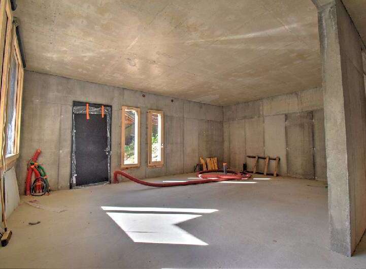 Discover this unfinished concrete space, perfect for customization and renovation.