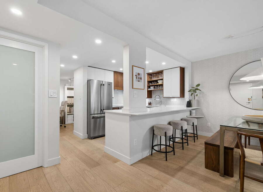 Experience modern living in this beautifully appointed kitchen and dining area.
