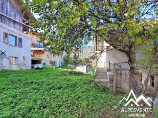 Discover this charming property nestled in a serene mountain setting, perfect for those seeking tranquility and natural beauty.