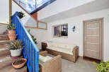 Discover this charming outdoor living space, perfect for relaxation and entertaining.