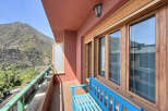 Enjoy breathtaking mountain views from this charming balcony, perfect for a morning coffee or evening relaxation.