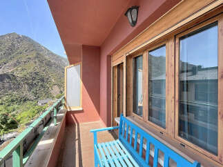Enjoy breathtaking mountain views from this charming balcony, perfect for a morning coffee or evening relaxation.