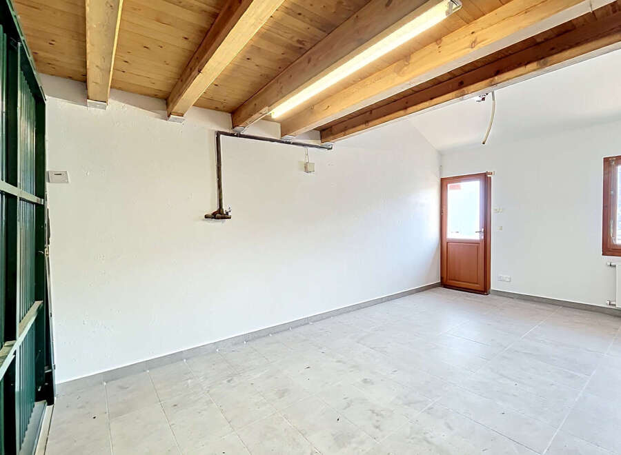 Discover this spacious, unfinished room, perfect for customization.