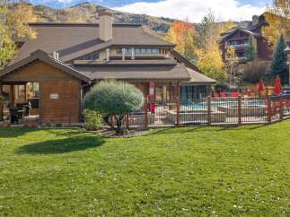 Enjoy the crisp autumn air and vibrant fall foliage surrounding this beautiful property.