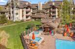 Experience luxury living with this stunning property featuring a sparkling blue swimming pool and relaxing hot tubs, perfect for unwinding.