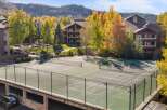 Enjoy outdoor recreation with this stunning tennis court, perfect for a friendly match or practice.